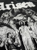 Close-up of the Black Arisen tee print and heavyweight fabric