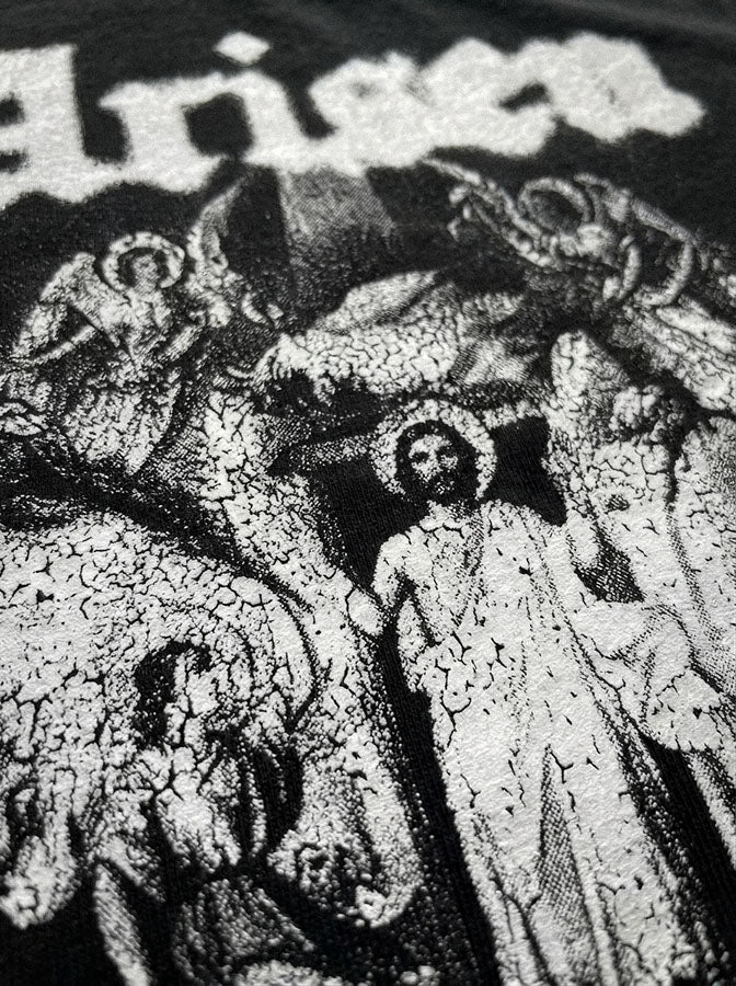 Close-up of the Black Arisen tee print and heavyweight fabric