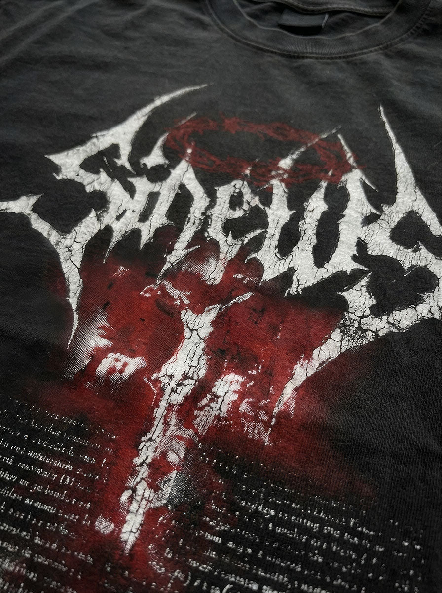 Close-up of the Crowned tee print and heavyweight fabric
