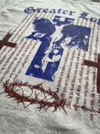 Close-up of the Greater Love tee print and heavyweight fabric